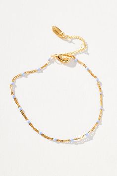 Gold-plated brass, enamel Lobster clasp Imported | Delicate Bead Necklace by Anthropologie in Purple, Women's, Gold/Plated Brass/Enamel Elegant Enamel Jewelry With Lobster Clasp, Dainty Adjustable Enamel Jewelry, Dainty Beaded Metal Jewelry, Elegant Enamel Jewelry With Delicate Chain, Metal Jewelry With Tiny Beads For Gift, 50 Fashion, Bead Necklace, Lobster Clasp, Diy Jewelry