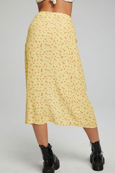 The boho life is the best life. Reach for our Women's Belle Midi Skirt for your daily dose of florals, flair and good vibes! Snatch the matching top to make it a total mood. Style with matching top (sold separately). Color: Anise Flower, pale yellow Women's Belle Midi Skirt Kinney Rayon Fabric Content: 55% Viscose 45% Rayon Model is 5'9" and wearing a size small Imported Style: CW9482-CHA7128-ANFLWR Floral Print Midi Skirt For Brunch, Long Floral Print Skirt For Brunch, Bohemian Floral Print Bottoms For Spring, Floral Print Relaxed Skirt For Brunch, Floral Print Flared Skirt For Brunch, Relaxed Floral Print Skirt For Brunch, Floral Print Relaxed Fit Skirt For Brunch, Bohemian Floral Print Skirt For Brunch, Chic Floral Print Vacation Skirt