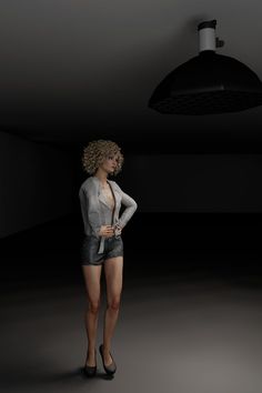 a woman standing in a dark room with her hands on her hips and wearing high heels