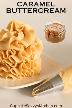 a white plate topped with lots of food next to a jar of caramel buttercream