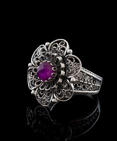 Elevate your femininity with this exquisite lace daisy flower design 925 Sterling silver ring featuring a stunning opaque Ruby corundum gemstone. This versatile piece is perfect for daily wear and is an ideal accessory for special occasions such as weddings, engagements, proms, and other celebrity events. The elegant and intricate design also makes it a perfect gift option for holidays, birthdays, Christmas, mother`s day, and any other special occasion. Crafted with exceptional attention to deta Elegant Flower Ring Stamped 925, Elegant Ruby Ring Stamped 925, Celebrity Events, Daisy Flower Design, Women Flower, Statement Ring Silver, Rose Quartz Gemstone, Sterling Silver Filigree, Filigree Ring