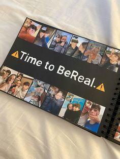 a book that is laying on top of a white sheet with pictures of people in it