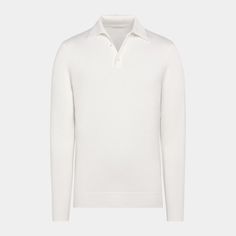 This off-white long sleeve polo is tailored to a slim fit and features a classic button collar, mother of pearl buttons, and ribbed hem and cuffs. Formal Fitted Polo Shirt With Spread Collar, Classic Fitted Polo Shirt For Workwear, Formal Polo Collar Top With Button Closure, Long Sleeve Polo Shirt With Buttons For Work, Elegant Fitted Polo Shirt For Semi-formal Occasions, Elegant Fitted Polo Shirt For Semi-formal Events, Formal Fitted Polo Shirt With Placket, Elegant Fitted Polo Shirt With Placket, Elegant Collared Polo Shirt With Button Closure