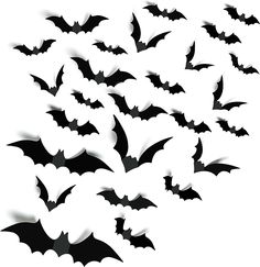 a flock of bats flying through the air