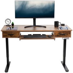 a computer desk with a monitor, keyboard and mouse on it in front of a white background