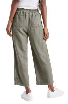 Easy does it in lightweight, linen-kissed pants designed with wide legs in a slightly cropped silhouette. 25" inseam; 20 1/2" leg opening; 9 3/4" front rise; 14" back rise (size Medium) Elastic/drawstring waist Front slant pockets; back patch pockets 73% lyocell, 27% linen Machine wash, tumble dry Imported Wide Leg Cotton Capris, Relaxed Cropped Leg Bottoms For Spring, Casual Linen Straight Capris, Cotton Wide Leg Capris, Casual Straight Linen Capris, Relaxed Fit Wide Leg Cotton Capris, Casual Wide Leg Cropped Pants With Elastic Waistband, Casual Loose Fit Cropped Wide Leg Pants, Casual Wide Leg Cropped Pants With Relaxed Fit