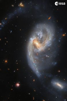 two spiral galaxy like objects in the sky