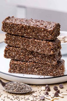 three chocolate granola bars stacked on top of each other