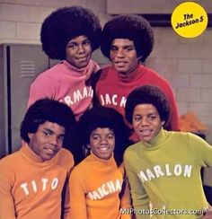 the jacksons posing for a photo in their matching sweaters