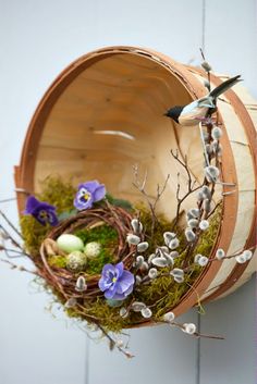 an image of a basket with flowers in it on the webpage for crafts and sewing