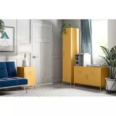 a living room with yellow cabinets and blue chairs