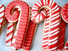 some very pretty decorated cookies with candy canes