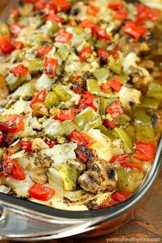 a casserole dish with chicken, peppers and mushrooms