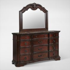 an antique dresser with mirror on top and drawer below it, against a white background