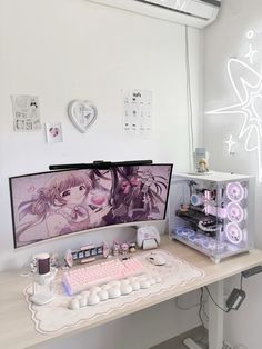 a desktop computer sitting on top of a wooden desk