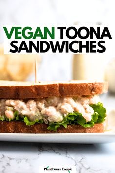 Head on view of a white bean salad sandwich with lettuce and text reading vegan toona sandwiches Vegan Chickpea Tuna, Vegan Sandwich Filling, Vegan Tuna Salad, Vegan Tuna, Chickpea Tuna Salad, Chickpea Tuna, Vegan Sandwiches, Chickpea Salad Sandwich, Tuna Salad Sandwich