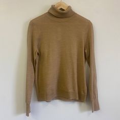 Color: Tan / Camel Women’s Size Medium New With Tags Nwt Classic Neutral Tops For Winter, Neutral Tops For Winter Workwear, Fitted Neutral Sweater For Work, Beige Wool Top For Spring, Beige Wool Tops For Spring, Lightweight Wool Beige Top For Spring, Classic Neutral Tops For Fall, Fitted Wool Top In Beige, Fitted Wool Beige Top