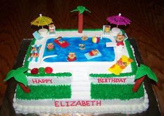 a birthday cake with an inflatable pool and beach scene on it's side