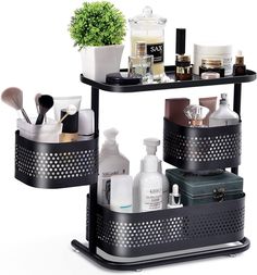 two tiered black shelf with cosmetics and toiletries on it