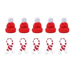 six red and white knitted hats with pom poms