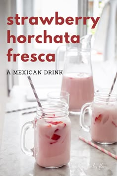 strawberry horchata fresca in mason jars with strawberries on the side