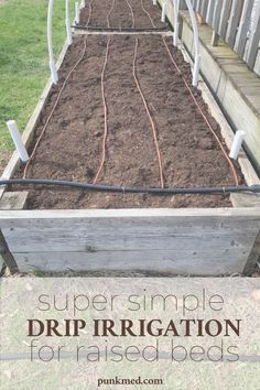 a garden bed with dirt in it and the words super simple drip irrigation for raised beds