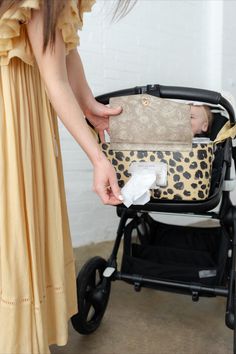 Our chic new stroller organizer accessory helps keep your essentials organized while on the go! This stroller caddy has enough space to store small items and even a Starbucks cup, you’ll get quick access to everything you need, right within your reach. It also features our signature Peek A Boo flap so you can easily grab a wipe when you need one—fast. Stroller Caddy, Bag Inspiration, Stroller Organizer, Stroller Bag, Insulated Bags, Starbucks Cup, Starbucks Cups, Accessory Organization, Travel Pouch