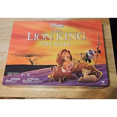 the lion king board game sits on a table