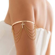 PRICES MAY VARY. Multilayer upper arm bracelet is made of alloy and rhinestone. Summer beach crystal arm chain available in gold and silver colors. adjustable open tassel armband design is unique, show you different after wearing. Simple rhinstone arm cuff bangle bracelets perfect for swimwear, swimsuit, bikini, summer tops, beach long dress, nightclub,etc. Rhinestone upper arm chain bracelet with chic style is perfect gift on birthdays, valentine's day, mother's day Elegant Beach Jewelry Made Of Alloy, Glamorous Summer Jewelry With Chain Detail, Glamorous Summer Jewelry With Chain, Glamorous Summer Chain Jewelry, Metal Chain Body Jewelry For Beach, Alloy Bracelet Body Jewelry For Parties, Party Alloy Bracelet Body Jewelry, Gold Metal Body Jewelry For Beach, Gold Alloy Body Jewelry For Party