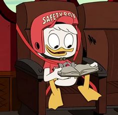 a cartoon character sitting in a chair reading a book