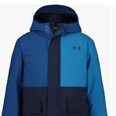 Blue Under Armor Jacket Size 4 Blue Winter Outerwear For Outdoor Activities, Blue Sporty Outerwear With Fleece Lining, Blue Winter Sports Outerwear, Blue Long Sleeve Parka With Fleece Lining, Blue Outerwear For Winter Sports, Blue Hooded Outerwear For Outdoor, Hooded Blue Outerwear For Hiking, Blue Hooded Outdoor Outerwear, Blue Hooded Parka With Fleece Lining