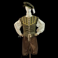 A complete look for your next Renaissance Faire, Festival, Larp, or other event! This costume includes a doublet, shirt, pants, and hat. Can be made in many colors, trimmed with either silver or gold details. The main fabric of the doublet is a durable micro suede and is lined with a non stretch two tone taffeta. The shirt is made of 100% cotton and can also be made in many different colors. The pants have a button closure and lacing tabs in the back for a perfect fit, and are made of a medium w Tudor Mens Clothing, Traditional Fitted Costume For Larp, Fitted Traditional Costumes For Larp, Traditional Fitted Costumes For Cosplay Events, Tudor Gown, Barbie Fairy, Medieval Clothes, Fashion Reference, Fairy Princess