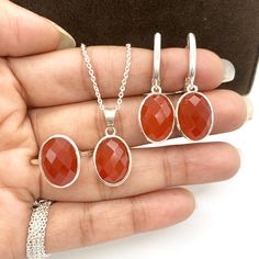 This Jewelry set comes with a 100% Natural Carnelian by Gemstone, and it is made up of 925 solid sterling silver. This Jewelry set is handcrafted by our skilled craftsmen and designed by us. Every gemstone is handpicked for the best quality. Material :- Silver (925 Solid Sterling Silver) Gemstone :- Natural Carnelian  All Item Weight :- 11.00 Garam Approx. Stone Shape :- Oval (Checker Cut) Gemstone Size :- 10x14 MM Payment Policy :- We accept payment through PayPal. All payments must be made wit Elegant Carnelian Gemstones For Gifts, Elegant Carnelian Gemstones As Gifts, Elegant Carnelian Gemstones As A Gift, Carnelian Jewelry With Polished Finish For Weddings, Red Carnelian Wedding Jewelry, Oval Carnelian Jewelry For Wedding, Faceted Carnelian Jewelry Gift, Orange Carnelian Jewelry For Anniversary, Carnelian Jewelry