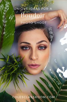 a woman with blue eyes is surrounded by green plants and leaves in a bathtub