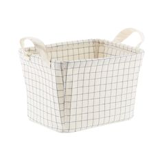 a white and blue checkered basket with handles on the front, sitting against a white background