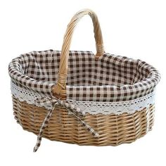 a brown and white checkered basket with lace on the handles, sitting in front of a white background