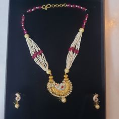 "IF YOU HAVE ANY DESIGN FOR JEWELRY OR NEED ANY GEMSTONE FOR JEWELRY PLEASE SHARE WITH US. BECAUSE WE ARE MANUFACTURER OF JEWELRY. WE MAKE IT FOR YOU ACCORDING TO YOUR CHOICE. YOU WILL RECEIVE EARRINGS MORE BEAUTIFUL THEN PICTURE. This beautiful handmade Necklace Set with Earrings is made of 18K Gold Gross Weight:- 19.135 gm(Weight may vary because it is handmade) (Net weight of pendent and earrings pearl necklace weight is not included) Gold Weight:- 19.135 gm This Necklace Set with Earrings is carefully handcrafted in my workshop. High value for money - Not once are we asked: \"How come your prices are so low?\" My mission is to make top-quality solid gold/silver jewelry affordable to every woman. ♥  This Jewelry with classic and elegant design is perfect for everyday wear, though fits p