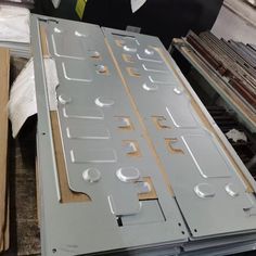 the metal parts are being assembled and ready to be put into the machine for assembly