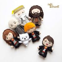 harry potter and hermione's hogwarts finger puppets on white background