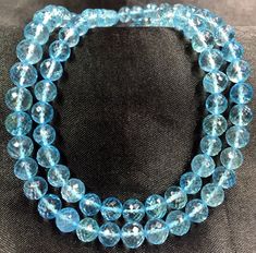 GEMSTONE --- SKY BLUE TOPAZ SHAPE --- ROUND (FACETED SIZE --- 6-7.MM LENGTH --- 18 INCH QUALITY --- TOP BEAUTIFUL TOPAZ ROUND BEADS FOR JEWELRY MAKING AND GIFT FOR ANYONE. If you have any questions about this item please contact me I will get back to you as soon as. We accept bulk or wholesale orders for any gemstone which you'll get best wholesale prices! Hence you can contact me with your requirement of bulk or wholesale order. I'll be happy to fulfill your order. Aquamarine Beads, Beads Wholesale, Topaz Necklace, Aquamarine Jewelry, Sky Blue Topaz, Teardrop Beads, Beads For Jewelry Making, Beads For Jewelry, Wholesale Beads