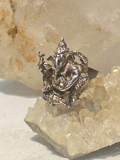 "Ganesha ring Elephant Ganesh band sterling silver women men Ganesh ,a Hindu god is traditionally worshipped before any major enterprise and is the patron of intellectuals, bankers, scribes, and authors.... Size 6 Between a size 6 and a size 6.25 Weight 5.6g Widest part 1 5/8\" Thinnest part of band 1/8\" Free Shipping & Free Postal Insurance Delivered in a Gift Box If you do not want the ring polished and want to leave the natural patina please let me know at the time of purchase as I do po Spiritual Sterling Silver Rings With Intricate Design, Spiritual Oxidized Finish Ring For Ceremonial Use, Spiritual Rings For Festivals Gift, Spiritual Rings As Festival Gifts, Silver Spiritual Rings For Festivals, Spiritual Silver Rings For Festivals, Spiritual Stamped 925 Silver Toe Ring, Spiritual Stamped 925 Toe Ring, Traditional Silver Rings For Festivals