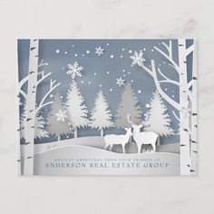 a christmas card with two deers in the woods and snowflakes on the trees