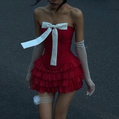 The Flirty Babe Bow Dress in Red is the perfect choice! With its coquette aesthetic bow, this dress exudes playfulness and charm. Perfect for a night out or a special occasion. Size:• S: Bust: 68-78cm/ 26.8-30.7 in, Waist: 62-72cm/ 24.4-28.3 in, Length (Top): 34cm/ 13.4 in• M: Bust: 72-82cm/ 28.3-32.3 in, Waist: 66-76cm/ 26.0-29.9 in, Length (Top): 35cm/ 13.8 in• L: Bust: 76-86cm/ 29.9-33.9 in, Waist: 70-80cm/ 27.6-31.5 in, Length (Top): 36cm/ 14.2 inMaterial: Polyester Potential Aesthetic, Mini Skirt Summer, Layered Mini Skirt, Group Outfits, Rok Mini, Club Outfits For Women, Dti Ideas, Tiered Ruffle Skirt, Red Party