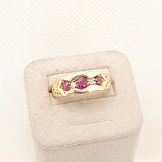 DESCRIPTION: A stunning antique Edwardian solid 18k 750 yellow gold ring, in great condition. The ring is mounted with 3 x genuine rubies and 2 x diamonds, all in an old cut style. The ring is fully hallmarked for 18ct 750 gold, dating to 1901. It weighs approx. 3.48g and sizes approx. at UK M or US 6.25. The overall condition is good and the shank is still lovely and thick. Mountains of unique antique and vintage pieces in our shop!  **FREE worldwide shipping on all items. Fill your boots **Ple