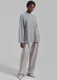 Color: Grey Melange Rib knit Relaxed fit Dropped shoulders Crew neckline Tonal embroidered logo Vented side seams Unlined 90% Wool 10% Cashmere Hand Wash or Dry Clean By Loulou Studio. Made in China Gray Cashmere Crew Neck Sweater, Gray Sweater With Ribbed Collar For Work, Oversized Gray Cashmere Sweater, Gray Oversized Sweater With Ribbed Collar, Oversized Gray Sweater With Ribbed Collar, Gray Sweater With Ribbed Collar For Loungewear, Loulou Studio, Grey Sweater, Drop Shoulder