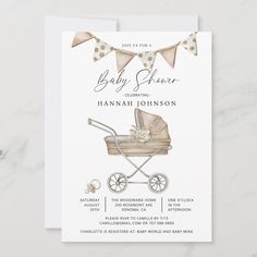 a baby shower card with a baby in a stroller and bunting flags on it