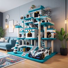 a living room with a blue couch and a cat tree in the middle of it