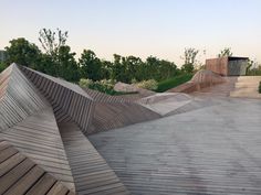 a skateboard park with ramps and wooden boards