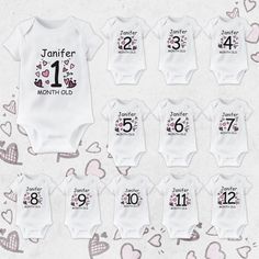 baby onesuits with hearts and numbers for each child's first birthday party