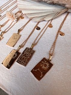 Our Zodiac Medallion Necklaces are elegantly crafted with an 18k gold-plating, ensuring lasting non-tarnishing shine. Each necklace is engraved on both sides; one with the traditional zodiac sign name, and the other with its unique constellation. These dainty pieces are perfect for layering and can be adjusted from 16" to 18", making them comfortable for all-day wear. Trustworthy and hypoallergenic, these necklaces add a classic and stylish twist to any outfit. Cute Zodiac, Medallion Necklace, Both Sides, Gold Plating, Constellations, Zodiac Sign, Zodiac Signs, Arrow Necklace, Layering